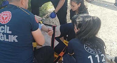 Takla atan otomobildeki 2 kişi yaralandı