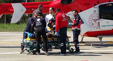 Tarlada bacağı kırılan kadın, ambulans helikopterle hastaneye ulaştırıldı