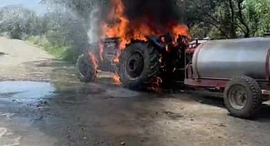 Alevlere teslim olan traktörde yaşanan patlama kameraya yansıdı
