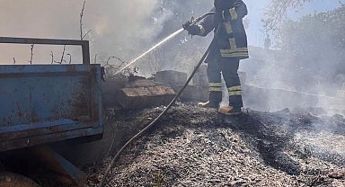 Altınözü'nde bahçede çıkan yangın römorka sıçradı