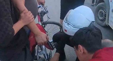 Ayağı bisiklete sıkışan çocuğun yardımına Yunus polisleri yetişti