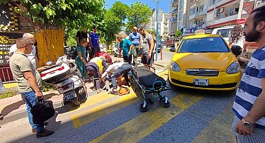 Efeler'de yolun karşısına geçmek isteyen kadına taksi çarptı: 1 yaralı