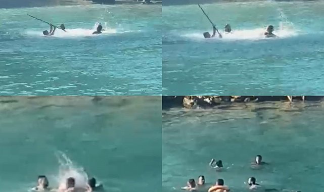 Mersin'de denizin ortasında sopalı kavga kamerada