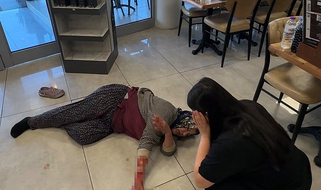 Tekmelere aldırmayan köpek kadının kolunu kopardı