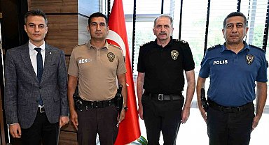 Uşak'ta örnek davranış sergileyen çarşı ve mahalle bekçisine teşekkür belgesi