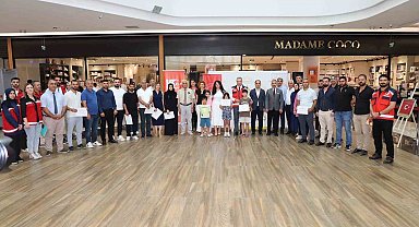 Adıyaman'da şehit yakınları ve gazilerin ebru sergisi açıldı