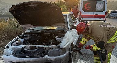 Antakya'da otomobilin motorundan alevler yükseldi