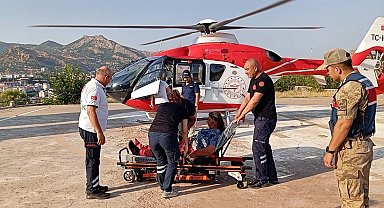 Ayağı kırılan kadın helikopterle hastaneye kaldırıldı