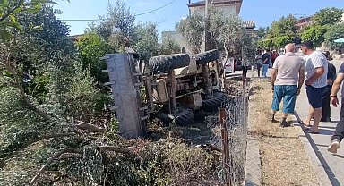 Bahçeye devrilen iş makinesinin sürücüsü hayatını kaybetti