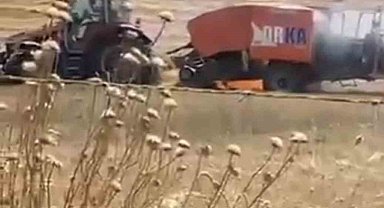 Balya makinesindeki yangın tarlaya sıçradı
