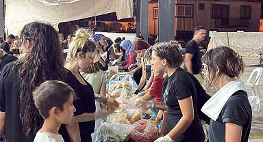 Bir yanda alevlerle mücadele, bir yanda yürek ısıtan dayanışma