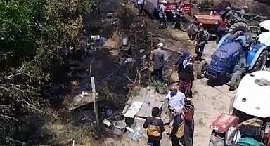 Evin avlusunda çıkan yangın büyümeden söndürüldü