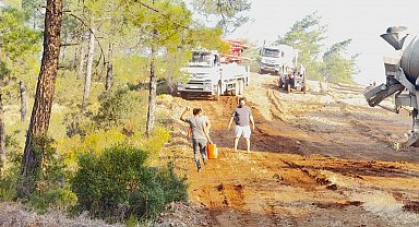 Fethiye Üzümlü'deki orman yangınında havadan ve karadan yoğun mücadele