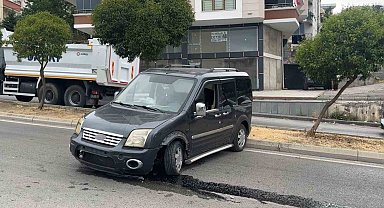 Freni boşalan hafif ticari araç 2 metreden yola düştü