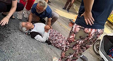 İzmir'de motosikletin çarptığı kadın yaralandı