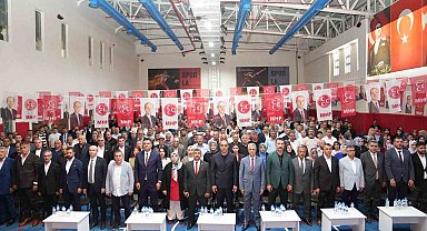 MHP'de ilçe kongreleri devam ediyor; Pasinler'de Erkan Yağar güven tazeledi