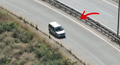 Otoyolda geri geri giden sürücü dron kamerasına yakalandı