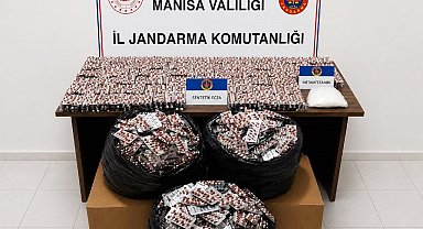 Otoyoldaki operasyonda bir araçta 59 bin adet hap ve 2 kiloya yakın uyuşturucu ele geçirildi