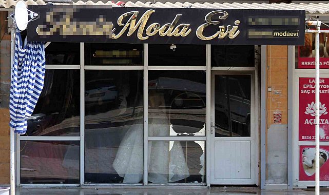 Boşanmak isteyen eşinin gelinlikçi dükkanını benzin dökerek ateşe verdi