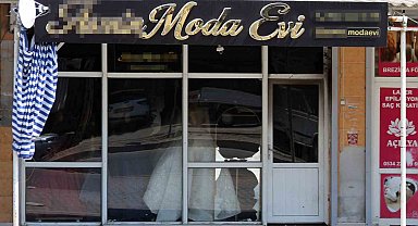 Boşanmak isteyen eşinin gelinlikçi dükkanını benzin dökerek ateşe verdi