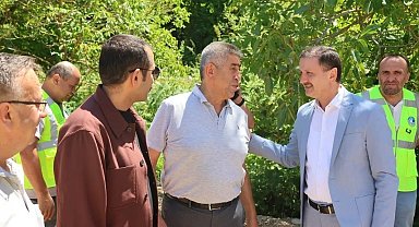 Köy yolundaki asfalt çalışmalarına yakın takip