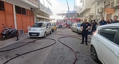 Arazözler park eden araçlar yüzünden yanan binaya ulaşamadı