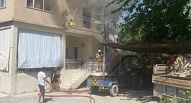 Erzin'de 2 katlı evde çıkan yangın büyümeden söndürüldü