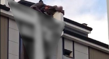 Eşiyle tartışıp çatıya çıkan genci Başkan son anda çekip aldı
