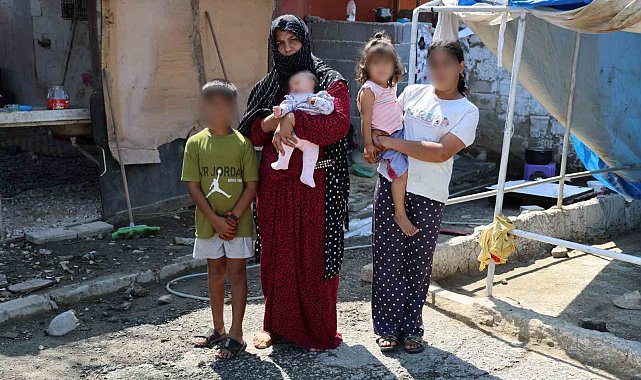 Ev alma hayaliyle kandırıldı, 5 çocuğuyla ahırda yaşamaya başladı