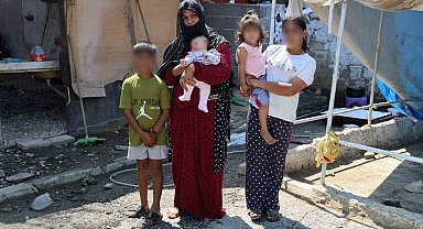 Ev alma hayaliyle kandırıldı, 5 çocuğuyla ahırda yaşamaya başladı