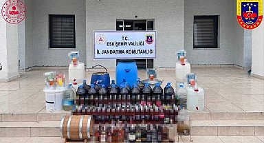 Evinde kaçak içki üretmek için damıtma sistemi kuran şüpheli yakalandı