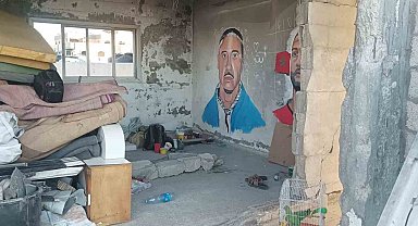 Gazze'de bir sanatçı daha, Filistin'i destekleyen ABD'li rapçi Macklemore'un duvar resmini yaptı