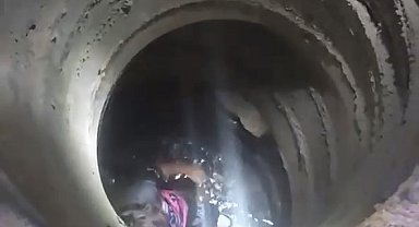 Kaldırımda yürürken su kuyusuna düşen çocuğu itfaiye ekipleri kurtardı
