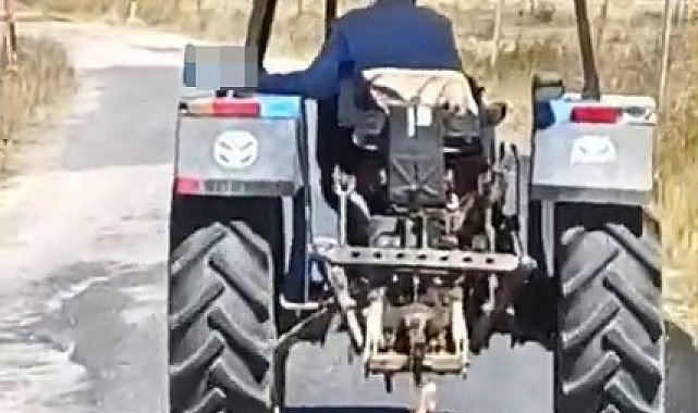 Köpeği traktöre bağlayarak sürükledi