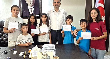 Kozan'da miniklerden afetzedelere 15 bin liralık destek