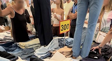 Semt pazarında kot pantolon iadesi gerginliği