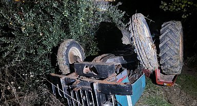 Altınözü'nde ters dönen traktörün altında kalan sürücü yaralandı