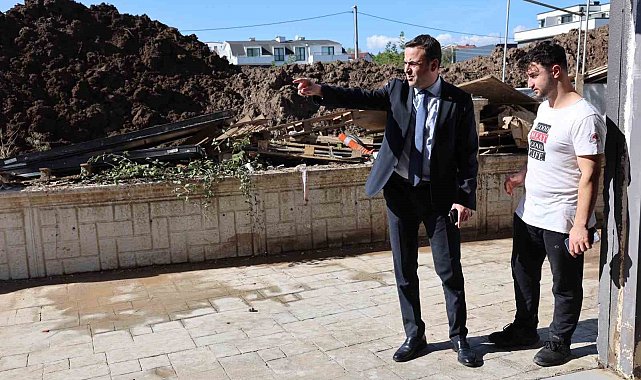 Başkan Özlü'den selzede esnafa destek