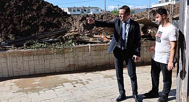 Başkan Özlü'den selzede esnafa destek