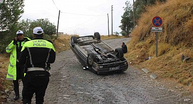 Freni tutmayan otomobil takla attı