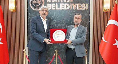 Kitap Fuarı ve Kerge Festivali için Başkan Hallaç'a plaket