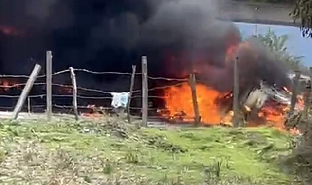 Lastiği patlatan tır köprüden uçarak alev topuna döndü