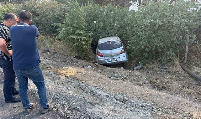 Serik'te kontrolden çıkan otomobil şarampole yuvarlandı
