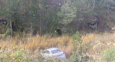 Tavşanlı'da dere yatağına devrilen otomobilin sürücüsü yaralandı